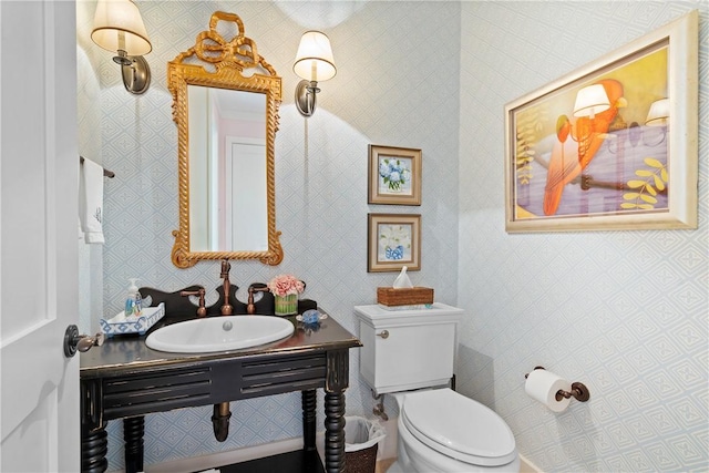 bathroom with toilet and sink