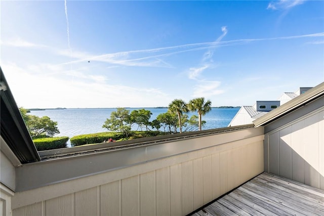 balcony featuring a water view