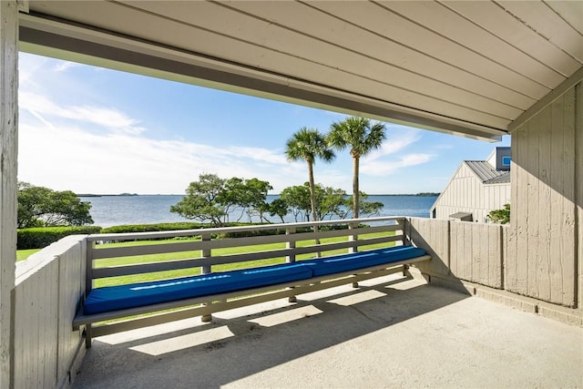 view of patio / terrace with a water view