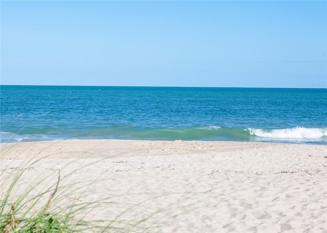 property view of water featuring a view of the beach