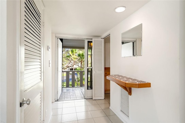 entryway featuring light tile patterned floors