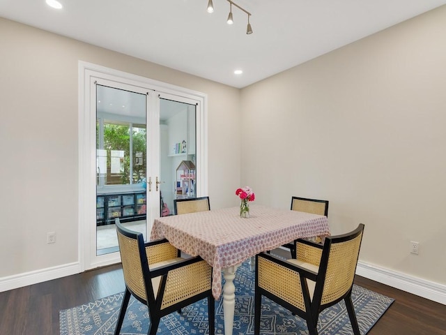 dining space with recessed lighting, dark wood finished floors, and baseboards