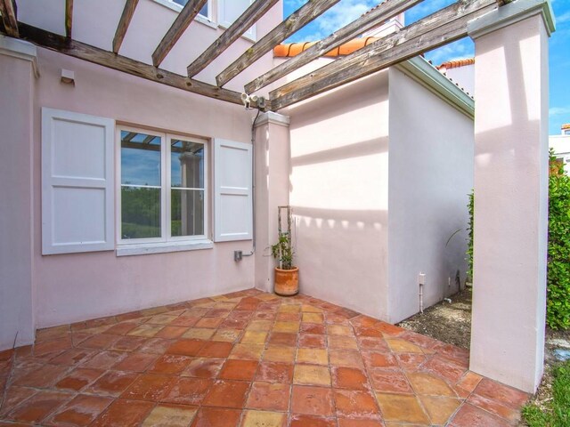 view of patio featuring a pergola