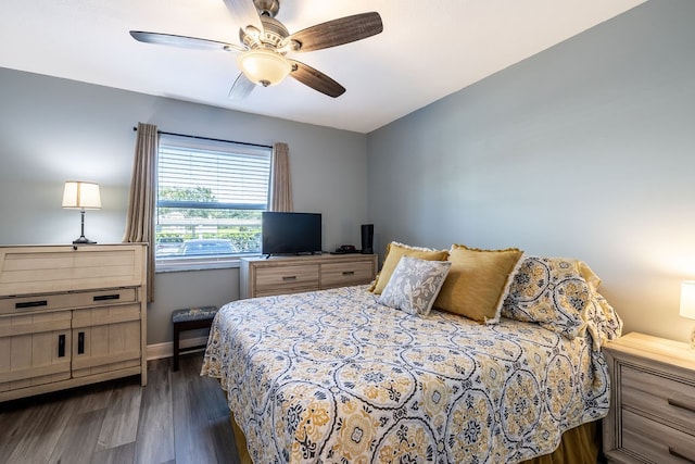 bedroom featuring dark wood-type flooring and ceiling fan