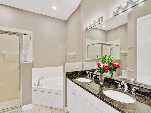 full bathroom with vanity, toilet, independent shower and bath, and tile patterned flooring