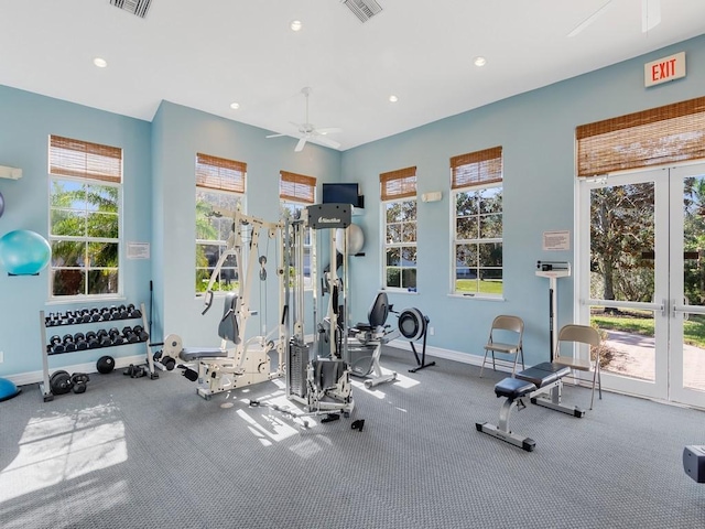 exercise room featuring ceiling fan and french doors