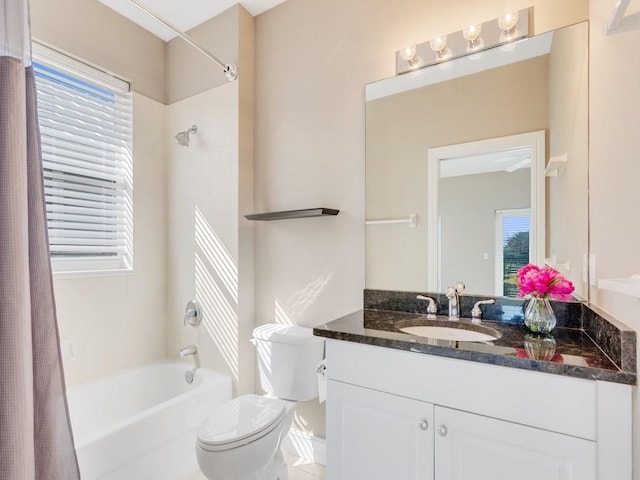 full bathroom featuring shower / tub combo with curtain, vanity, and toilet