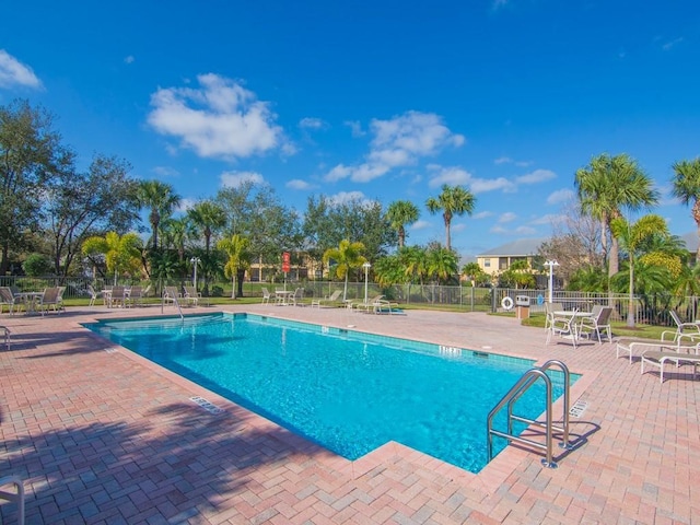 view of pool featuring a patio