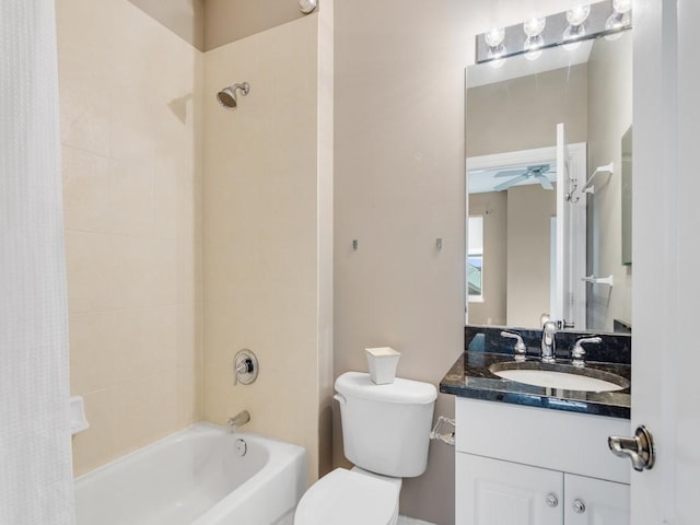 full bathroom featuring shower / tub combo with curtain, vanity, toilet, and ceiling fan