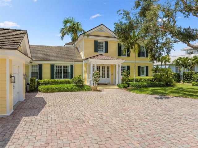 505 Live Oak Rd, Vero Beach, FL 32963 - view of front of home featuring french doors