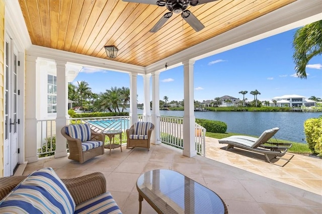 505 Live Oak Rd, Vero Beach, FL 32963 - view of patio / terrace with a water view and a ceiling fan