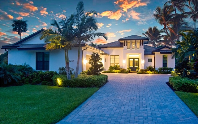 view of front of home featuring a yard