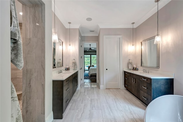 bathroom with vanity and ornamental molding