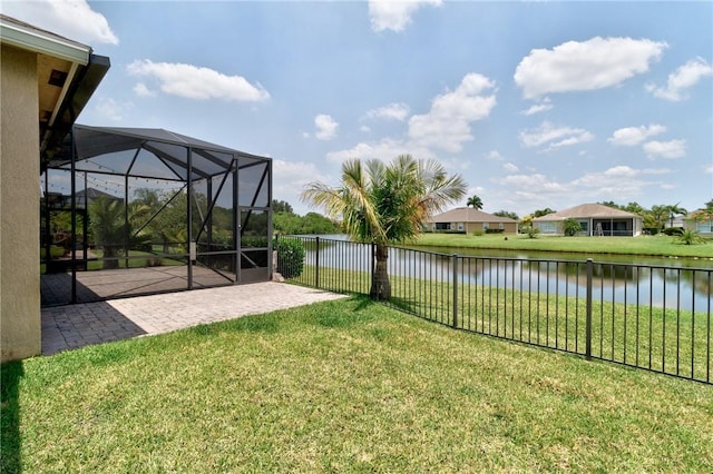765 Fortunella Cir SW, Vero Beach, FL 32968 - view of yard featuring a water view, a patio area, and glass enclosure