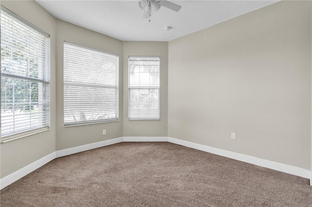765 Fortunella Cir SW, Vero Beach, FL 32968 - carpeted spare room featuring a ceiling fan and baseboards