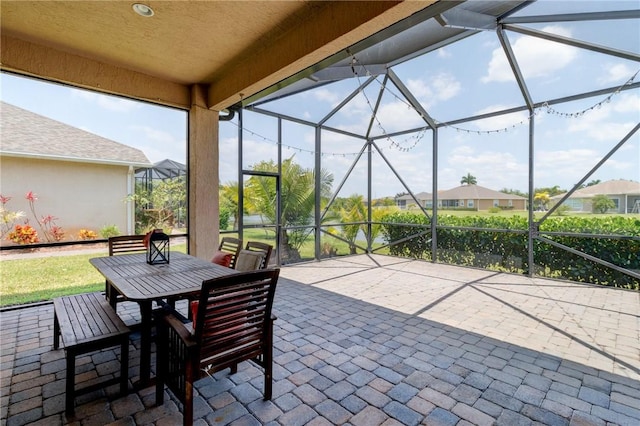 765 Fortunella Cir SW, Vero Beach, FL 32968 - view of patio / terrace with glass enclosure and outdoor dining space