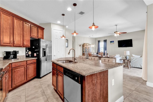 765 Fortunella Cir SW, Vero Beach, FL 32968 - kitchen with a sink, appliances with stainless steel finishes, light tile patterned floors, ceiling fan, and recessed lighting