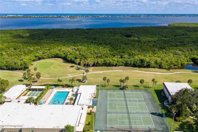 birds eye view of property with a water view