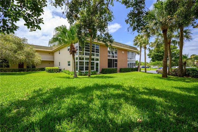 exterior space with a yard