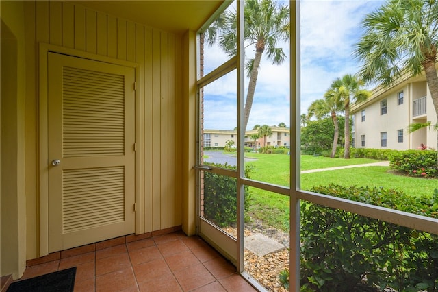 unfurnished sunroom featuring a wealth of natural light