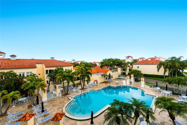 view of pool featuring a patio area