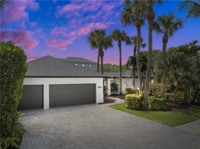 view of front of property featuring a garage