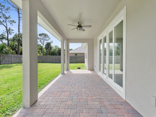 view of patio / terrace featuring ceiling fan