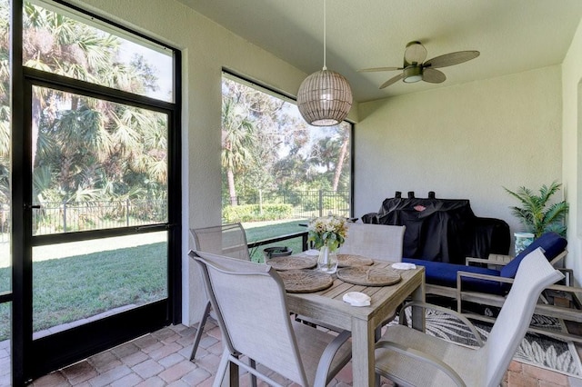 3577 Loblolly Sq, Vero Beach, FL 32966 - sunroom / solarium with ceiling fan and outdoor dining space