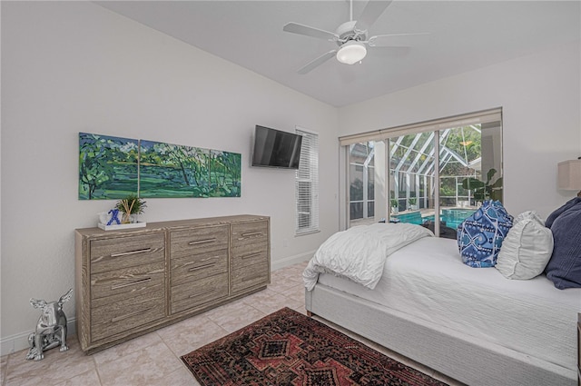 bedroom with a ceiling fan, access to exterior, a sunroom, baseboards, and light tile patterned flooring