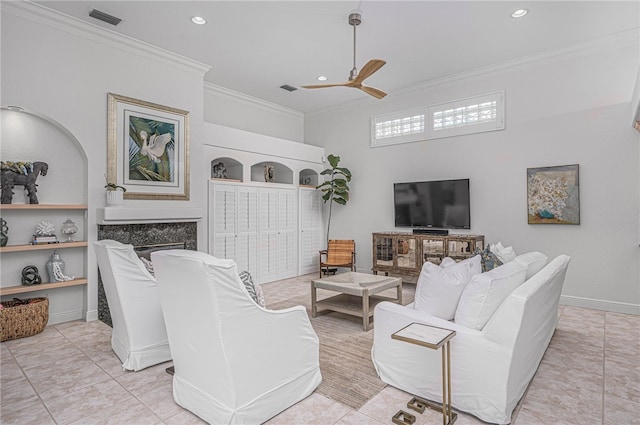 living area featuring ceiling fan, visible vents, tile patterned floors, ornamental molding, and recessed lighting