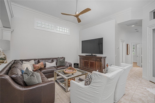 living room featuring light tile patterned floors, ceiling fan, ornamental molding, and a wealth of natural light