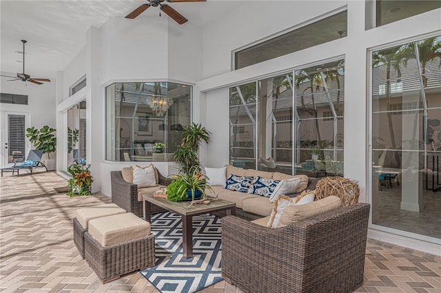view of patio with a ceiling fan and outdoor lounge area