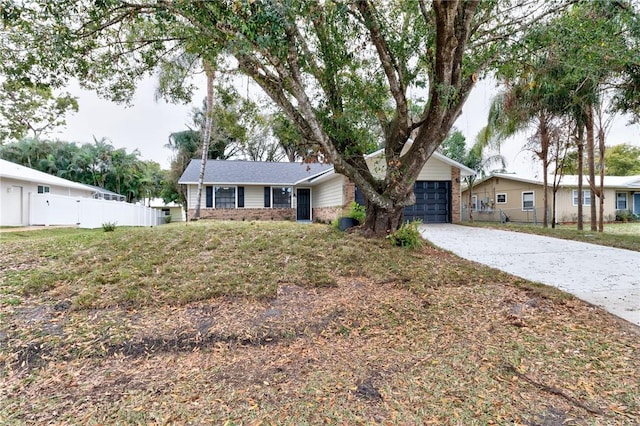 single story home featuring a garage