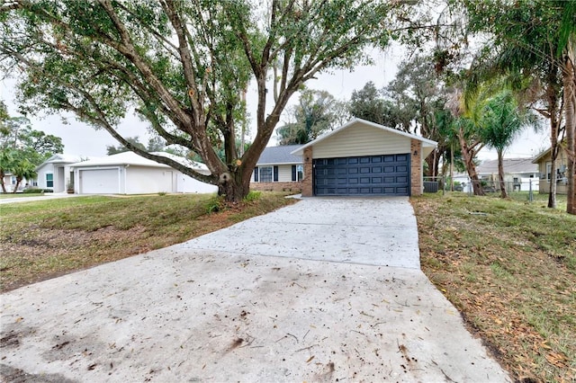 single story home with a garage