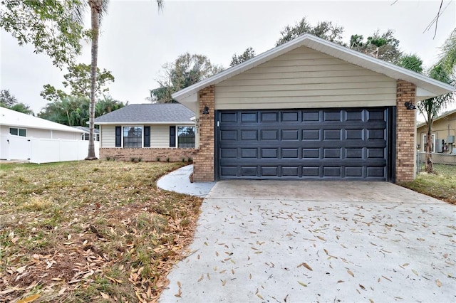 ranch-style home with a garage