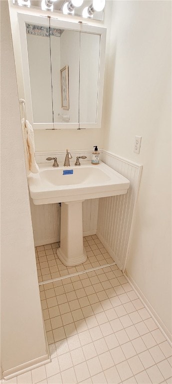 bathroom with tile patterned flooring