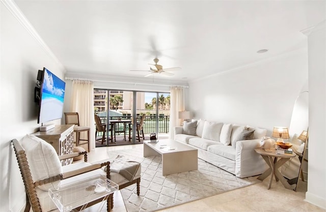 living room with ceiling fan and crown molding