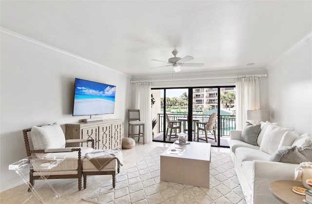 living room with ceiling fan and crown molding