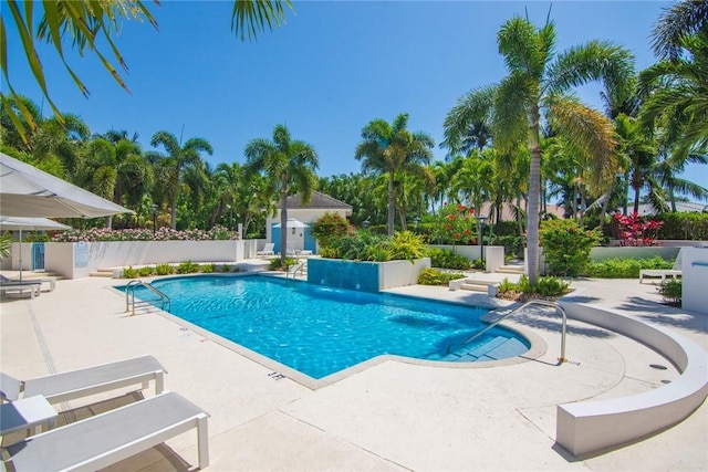 9013 Somerset Bay Ln Unit 402, Vero Beach, FL 32963 - view of swimming pool with a patio area