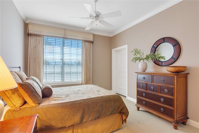9013 Somerset Bay Ln Unit 402, Vero Beach, FL 32963 - bedroom with light colored carpet, crown molding, a ceiling fan, and baseboards