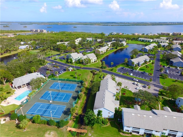 bird's eye view with a water view