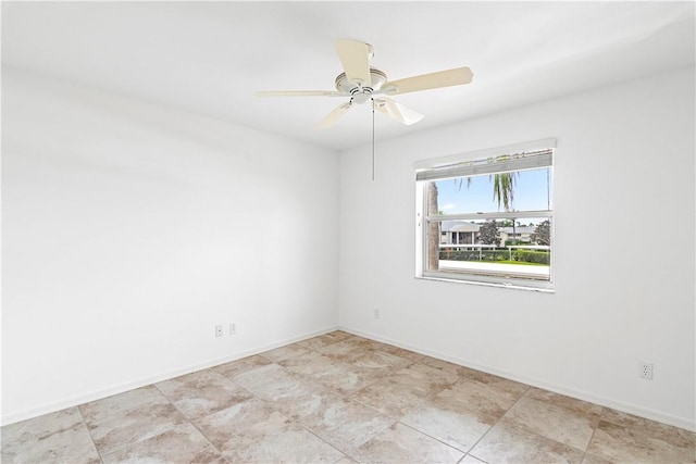 unfurnished room featuring ceiling fan