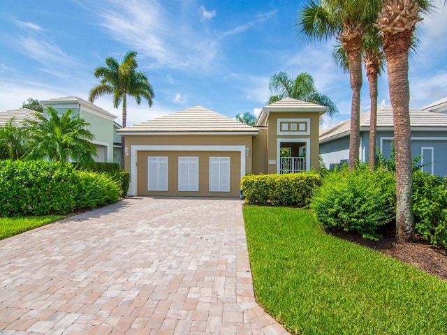 view of front of property with a garage