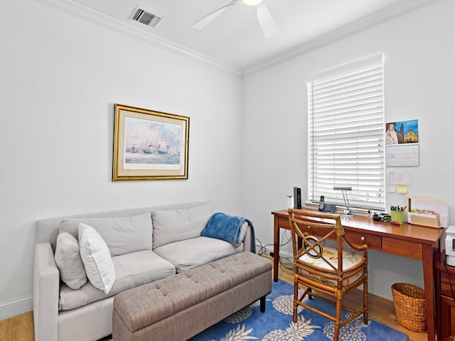 office space with ceiling fan, ornamental molding, and hardwood / wood-style floors