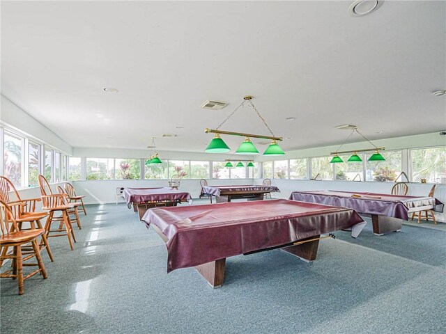 55 Woodland Dr Unit 206, Vero Beach, FL 32962 - rec room with billiards and healthy amount of natural light