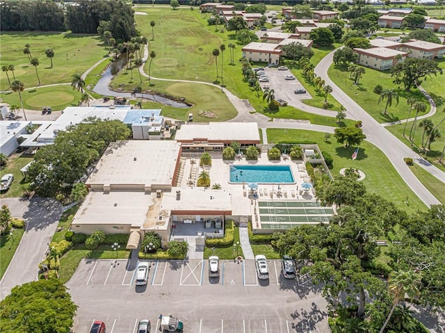 55 Woodland Dr Unit 206, Vero Beach, FL 32962 - aerial view of property's location featuring a golf course and a pool area