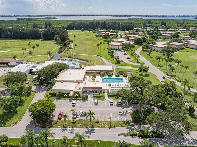 55 Woodland Dr Unit 206, Vero Beach, FL 32962 - aerial overview of property's location with a nearby body of water and a golf course