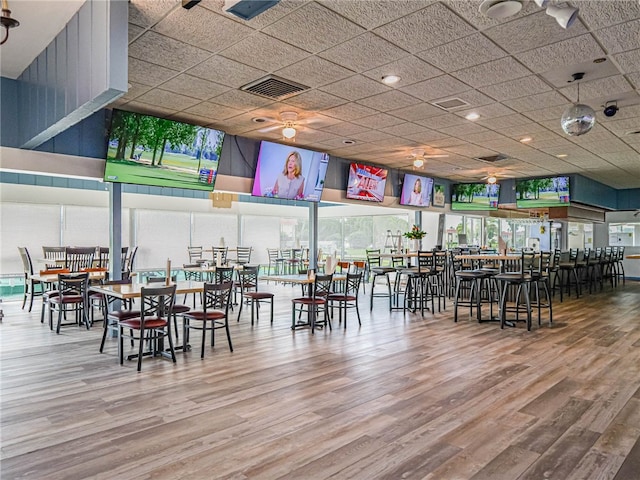 dining area with wood-type flooring