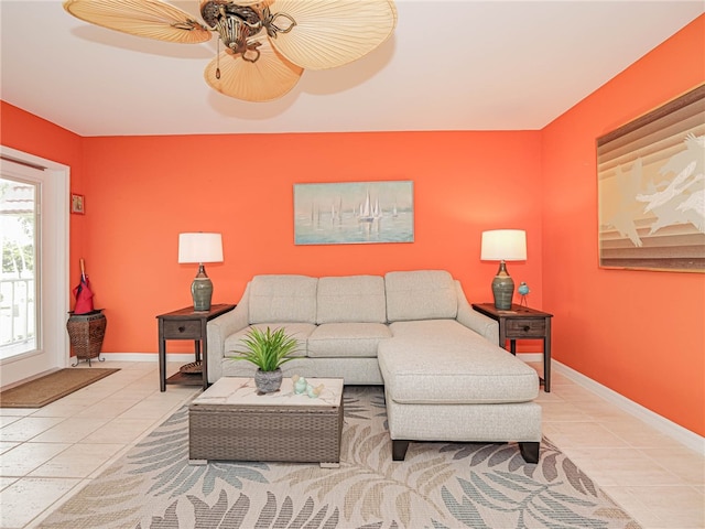 living room featuring tile patterned flooring and ceiling fan