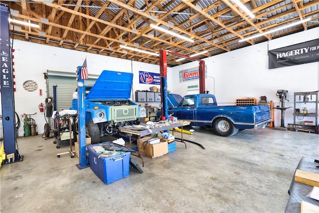 garage with a workshop area